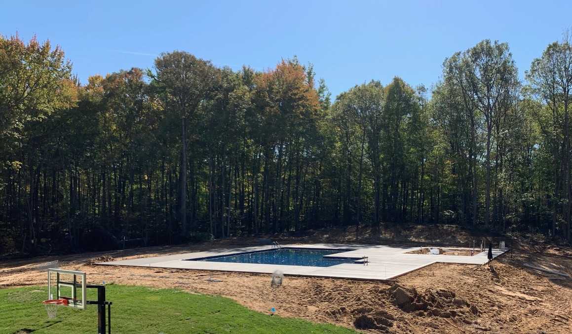 Custom concrete pool surround