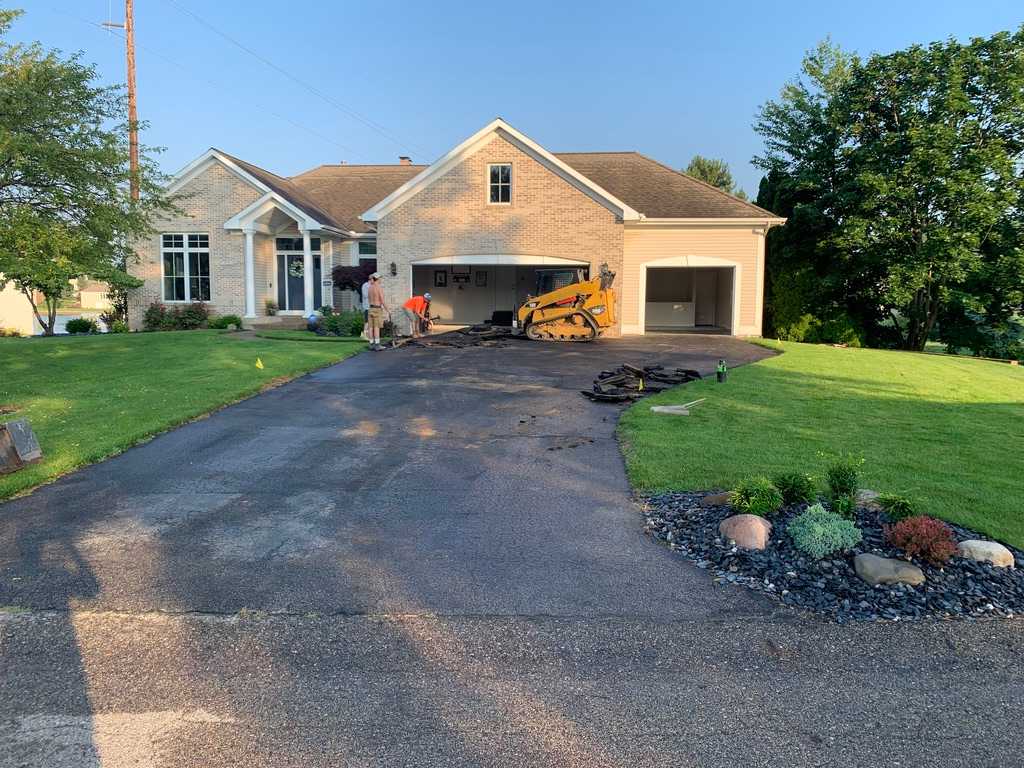 Residential concrete construction with old asphalt