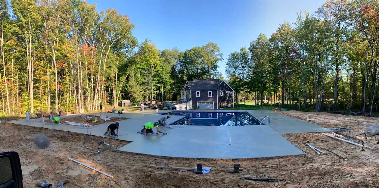 Custom concrete pool surround